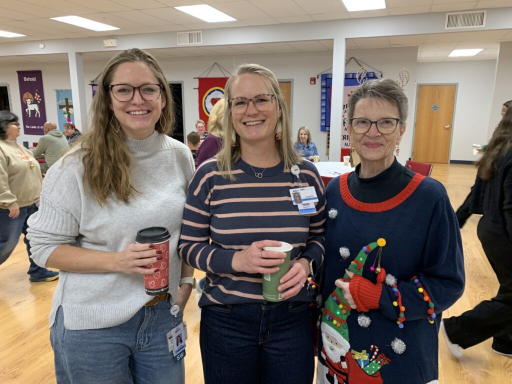 Women sharing a joyful moment together, representing connection, support, and community care